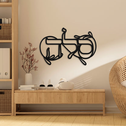 Wall art featuring the Hebrew word 'סלה' (Selah), meaning forever, displayed in a cozy living room with light decor.